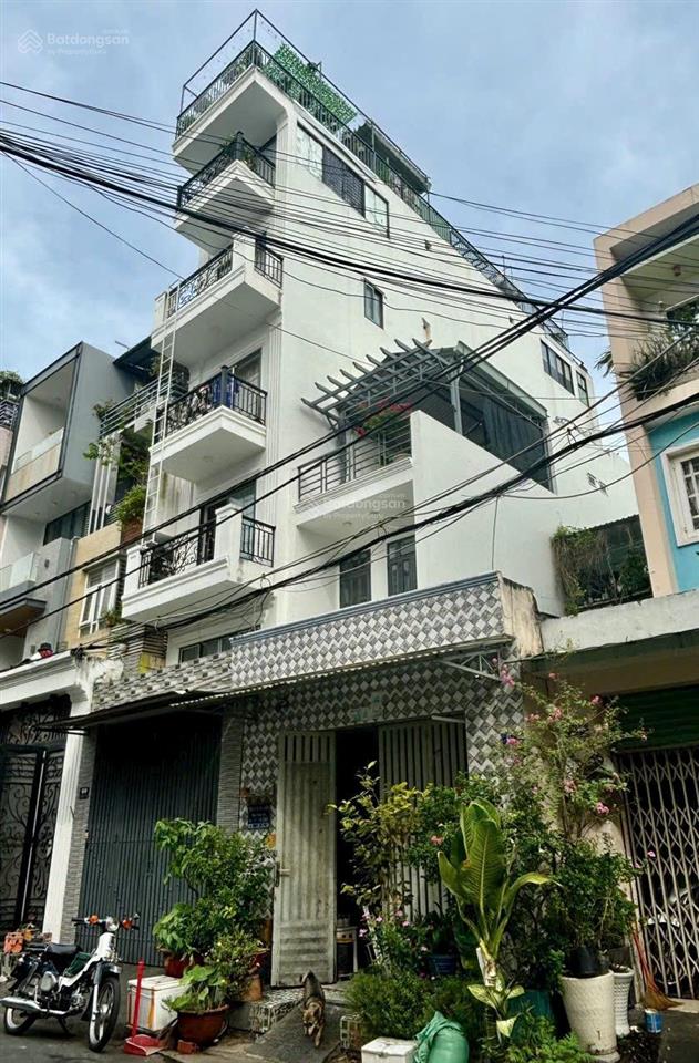 Bán căn hộ dịch vụ 11 phòng doanh thu 60 triệu/th có thang máy tại đường số 33 tân kiểng, quận 7