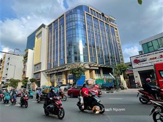Tòa nhà góc 2mt huỳnh văn bánh, phú nhuận  15x15m  9 tầng  hđt 200 triệu  giá 50 tỷ