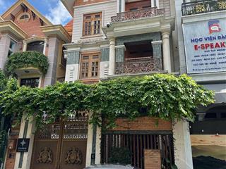 Bán căn nhà ngay an dương vương tự dt 8x20m cn 150m2 4 tầng thang máy giá bán 32.8 tỷ thương lượng