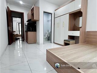 Tòa chdv tôn thất tùng, 54m2, 12 phòng, thu 70 triệu/tháng, gần phố, thoáng trước sau, đủ nội thất