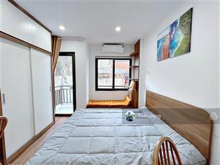 Tòa chdv trường chinh đống đa, 60m2*7t, 12 phòng rộng, dòng tiền 70 triệu/tháng, căn góc, ô tô đỗ