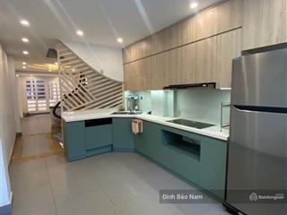 Văn cao ba đình  46m 5 tầng  mặt ngõ ô tô vào  2 mặt thoáng trước sau  sát hồ tây  nhà dân xây