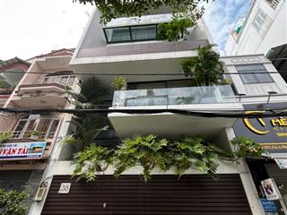 Nguyên căn mt sầm uất phan xích long, p2, dt 8x18m. 1 hầm 4 tầng. sàn suốt. giá 80tr/tháng