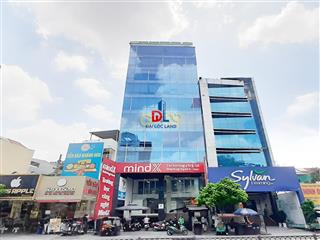 Cho thuê tòa nhà mt phan đình phùng đoạn đẹp. dt 10x22m. 2 hầm 8 tầng nổi. 2 thang máy