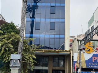 Tòa nhà văn phòng mt đường phan đình giót, phường 2. dt 10x23m. hầm  8 tầng. pccc. vị trí đẹp