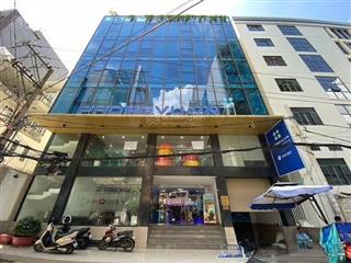 Tòa nhà văn phòng đường điện biên phủ, phường 25. dt 15x15m. hầm  7 tầng. ốp kính đẹp. pccc.