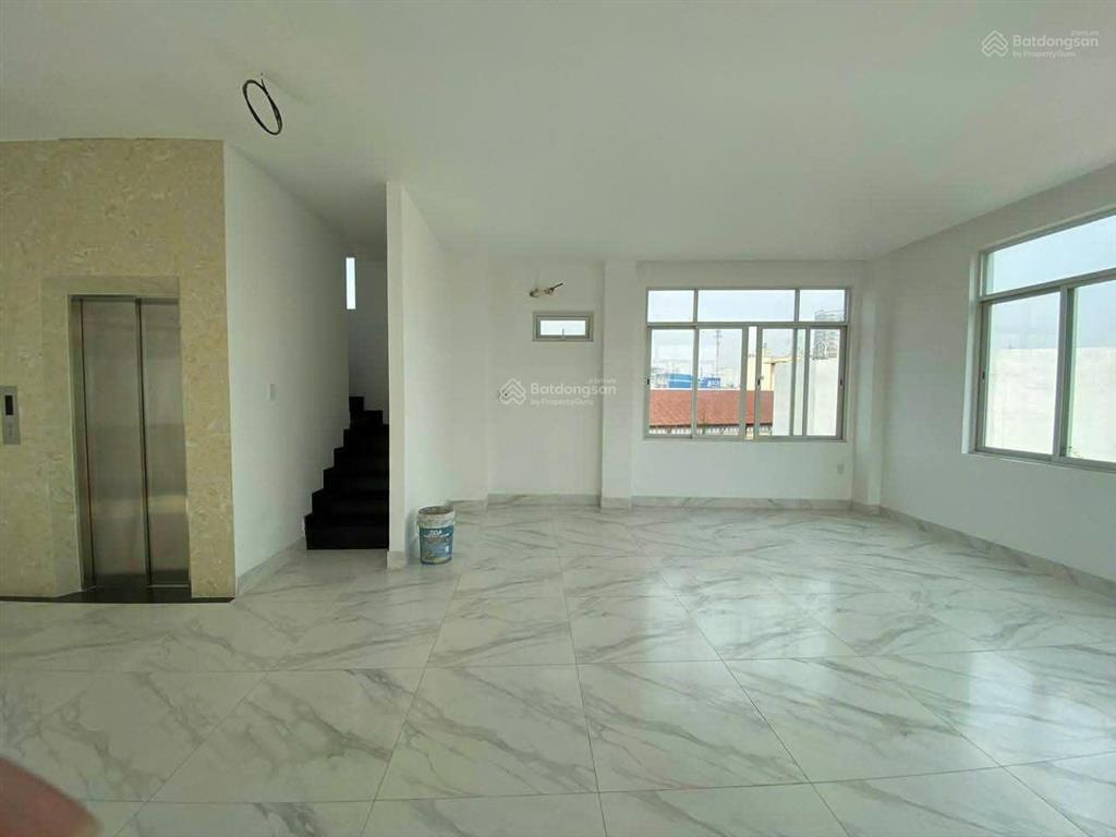 Nhà nguyên căn mt đường trần huy liệu, phường 8. dt 7x17m. trệt  4 lầu sân thượng. thang máy