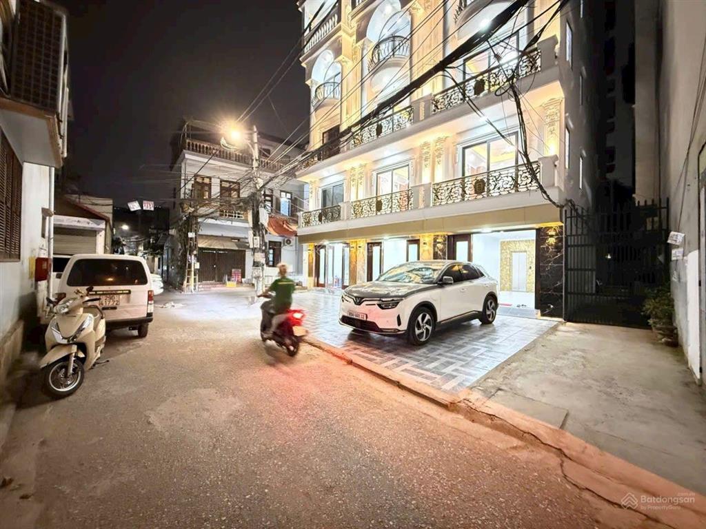 Nhà 61m xây 6 tầng, thang máy, sân để ô tô đường rộng ô tô tránh phố tư đình, long biên, hn 15.3 tỷ