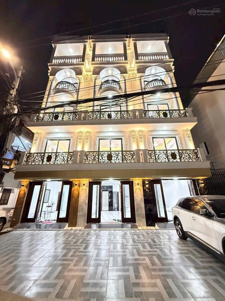 Nhà 61m xây 6 tầng, thang máy, sân để ô tô đường rộng ô tô tránh phố tư đình, long biên, hn 15.3 tỷ