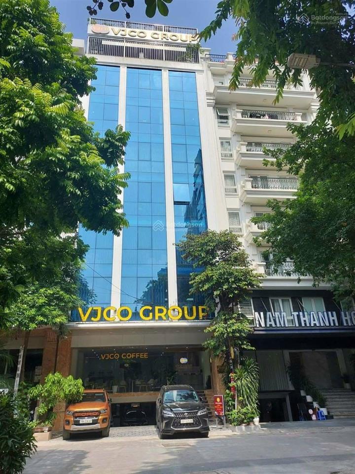 Cho thuê tòa nhà duy tân  trần thái tông 135m2 mt 6m 6t nổi 1 hầm thông sàn. giá 60 triệu/tháng