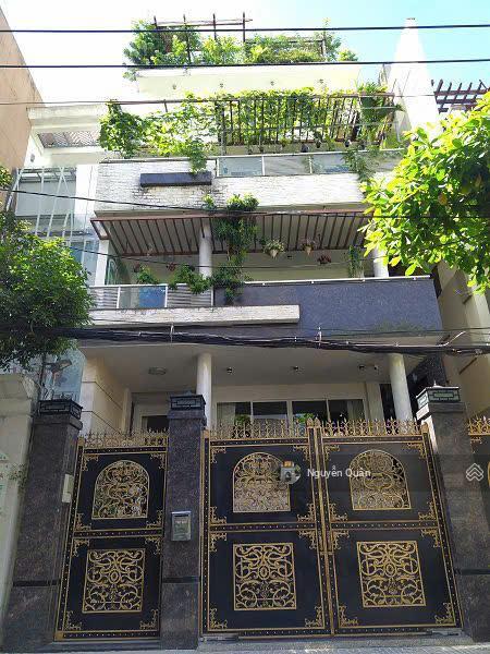 Toà nhà hầm + 5 tầng. dt 9x21m mặt tiền nguyễn minh hoàng, ngay lotte mart, k300, tân bình