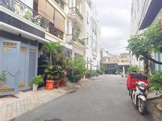 Nhà có ga ra xe hơi sát phạm văn đồng  dt 4x20m + 4 tầng  4pn, nhà đẹp ở ngay