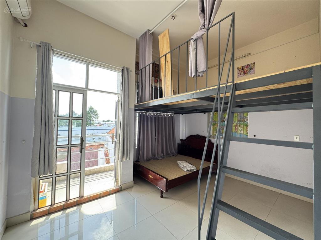 Chủ sang 51,2m2 nhà 1 trệt + 2 lầu mt xe ô tô trung tâm lái thiêu,sát bên lotte,bệnh viện becamex