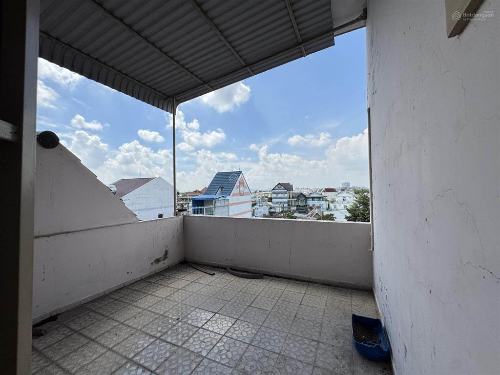 Chủ sang 51,2m2 nhà 1 trệt + 2 lầu mt xe ô tô trung tâm lái thiêu,sát bên lotte,bệnh viện becamex