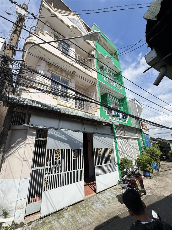 Chủ sang 51,2m2 nhà 1 trệt + 2 lầu mt xe ô tô trung tâm lái thiêu,sát bên lotte,bệnh viện becamex