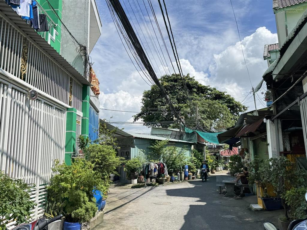 Chủ sang 51,2m2 nhà 1 trệt + 2 lầu mt xe ô tô trung tâm lái thiêu,sát bên lotte,bệnh viện becamex