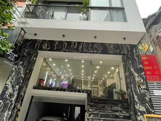 Toà building lô góc 8 nổi 1 hầm ô tô tránhlạc long quân dòng tiền 1,5 tỷ/ năm 100m2 51 tỷ