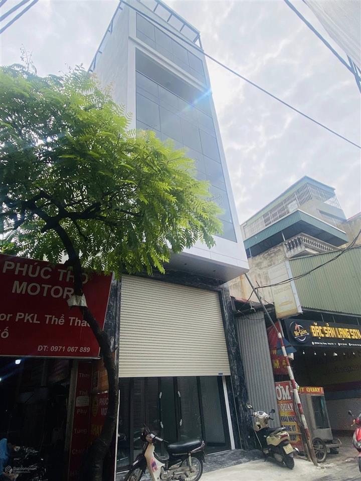 Hạ 2 tỷ! bán tòa văn phòng mặt phố vũ tông phan 80m,7t,mt5m chỉ 27 tỷ siêu đẹp