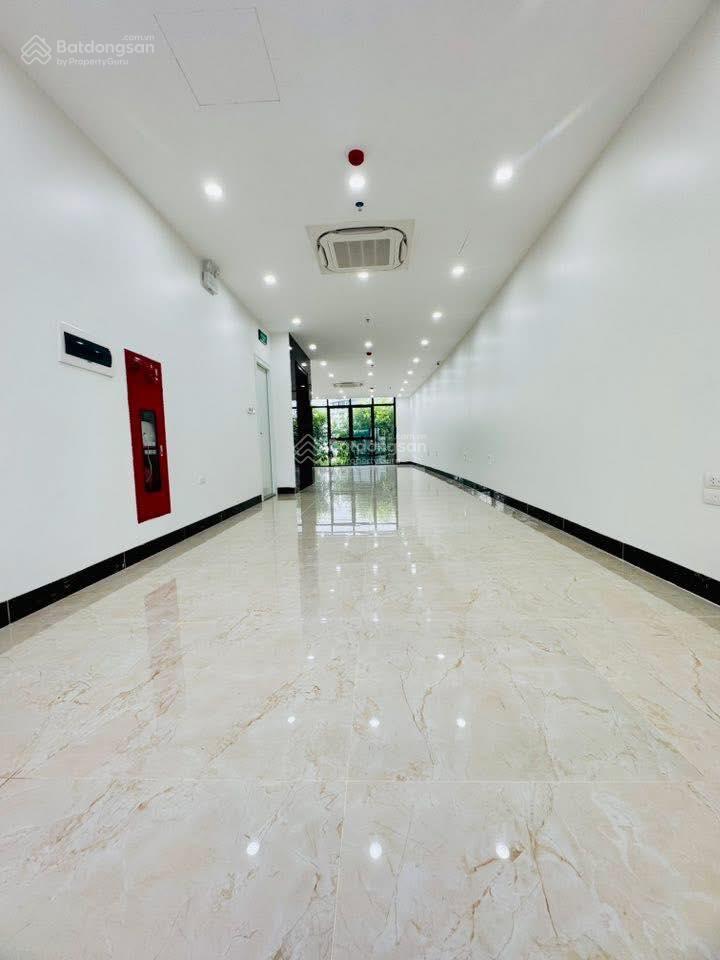 10 tầng mặt phố giảng võ đối diện vingroup 90 tỷ 2 mặt trước sau