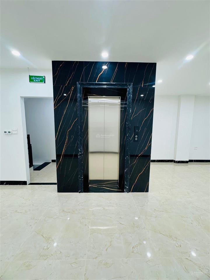 10 tầng mặt phố giảng võ đối diện vingroup 90 tỷ 2 mặt trước sau