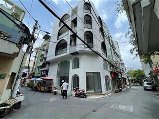 Góc 2 mặt tiền nguyên căn 4 lầu thang máy hẻm xe tải lê văn sỹ