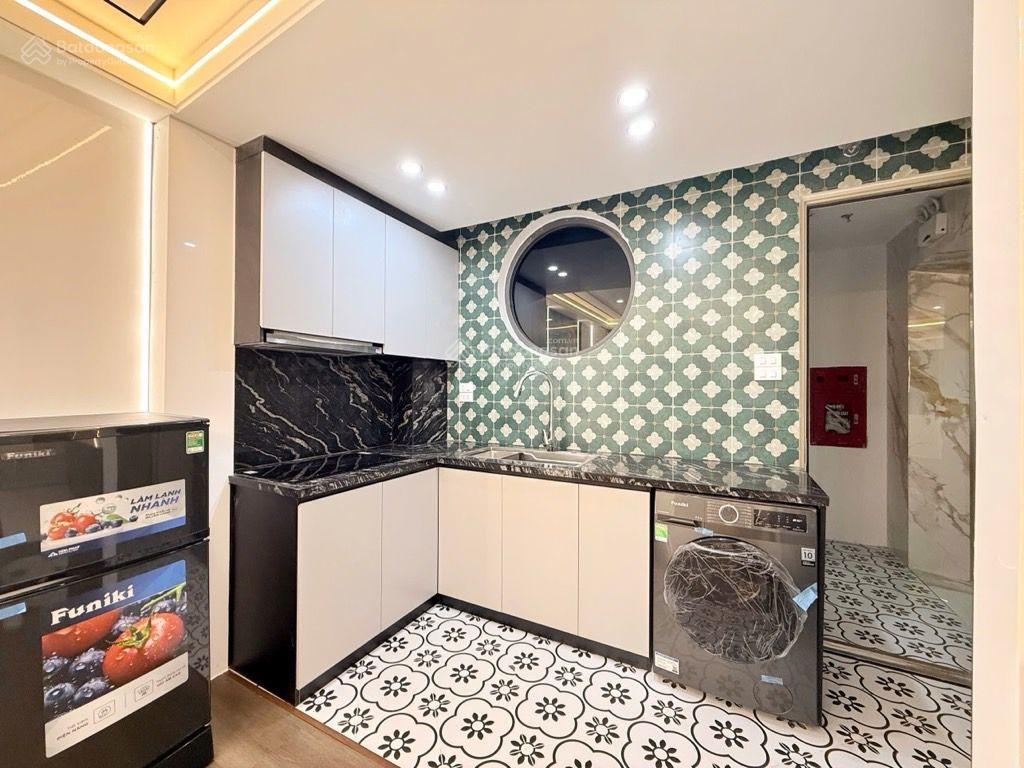 Lạc long quân  xuân la nhà dòng tiền siêu hiếm, dt 40m2 mt 5.2m xây 7 tầng, thang máy. pccc