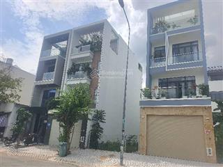Bán nhà nguyễn thị thập quận 7. dt 142m2. giá 16,5 tỷ. 5m x 28m. 4 tầng . hxh. gần huỳnh tấn phát