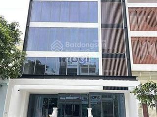 Bán tòa nhà mặt tiền ngay trần não, hầm + 5 tầng, hđ thuê 1.5 tỷ, giá 59 tỷ