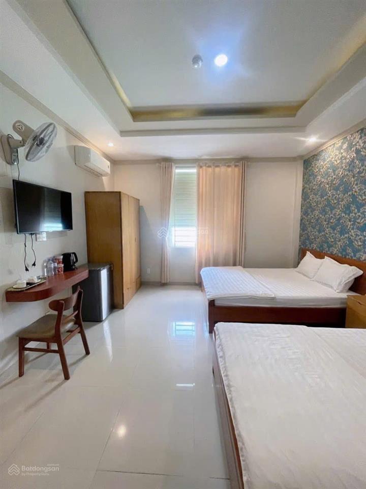 Bán đất có nhà nghỉ trên 22 phòng, doanh thu 100tr/tháng. 686m2  300m2 tc