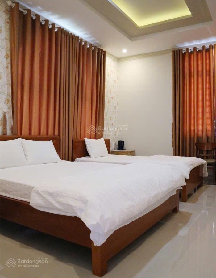 Bán đất có nhà nghỉ trên 22 phòng, doanh thu 100tr/tháng. 686m2  300m2 tc