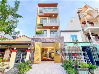 Nhà thang máydt 5mx18mđường rộng xe tảixây 1trệt 2lầu sân thượnggiáp phú mỹ hưng