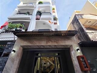 Nhà phố đường thông xe hơi đường huỳnh văn nghệ phường 15 tân bình diện tích 4 x17 trệt 3 lầu