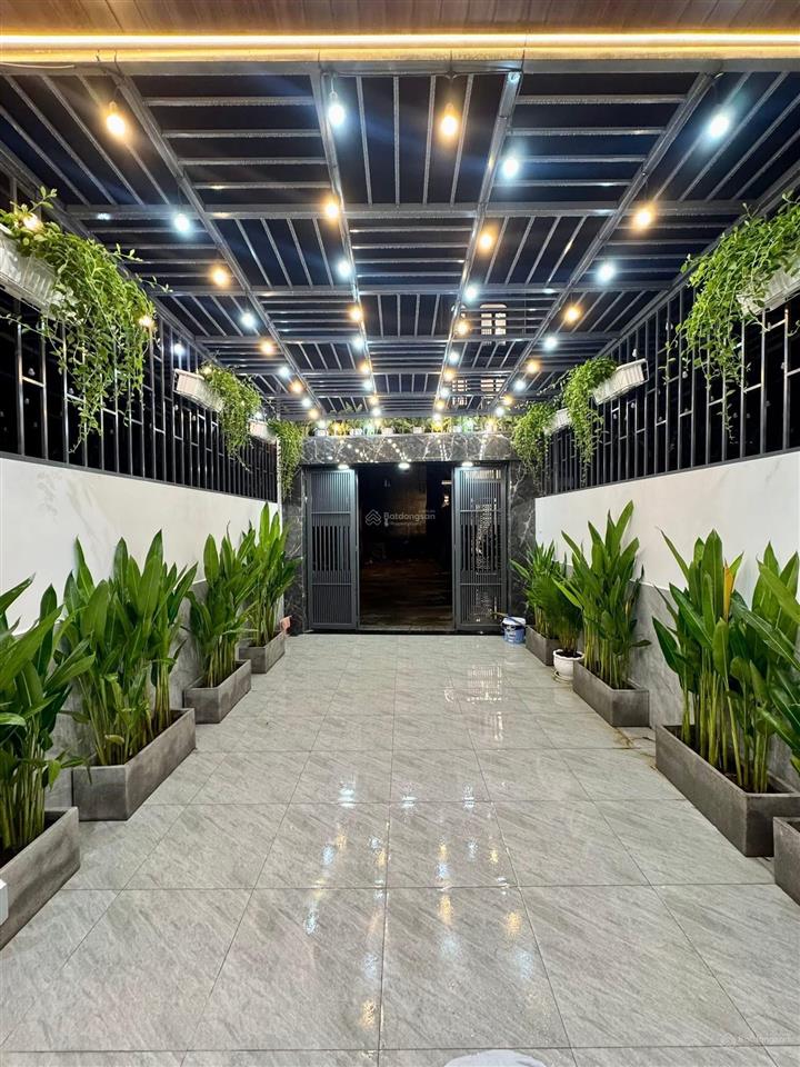 Nhà 3 lầu cao cấp sân xe hơi hẻm 12m gần cầu an lộc  giáp gò vấp. dt. 4.1m x 19.8m  80m2. giá tốt