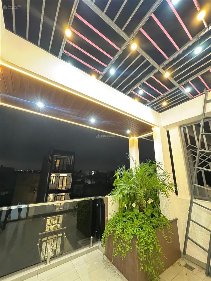 Nhà 3 lầu cao cấp sân xe hơi hẻm 12m gần cầu an lộc  giáp gò vấp. dt. 4.1m x 19.8m  80m2. giá tốt