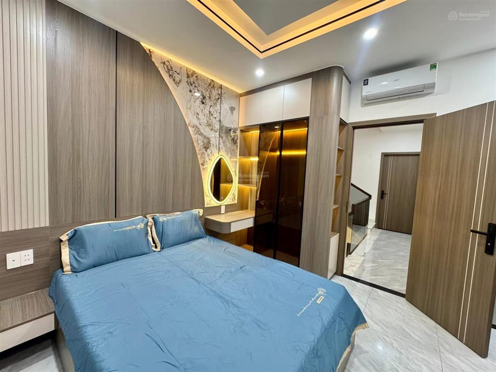 Nhà 3 lầu cao cấp sân xe hơi hẻm 12m gần cầu an lộc  giáp gò vấp. dt. 4.1m x 19.8m  80m2. giá tốt