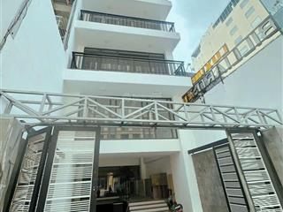 Tòa building thương mại văn phòng vip phú nhuận  1 hầm 6 tầng thông sàn  giá 36 tỷ x 150m2