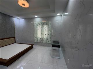 Bán cặp nhà sát aeon dt 10x20 xd 1 hầm 4 lầu . giá 33,5 tỷ tl