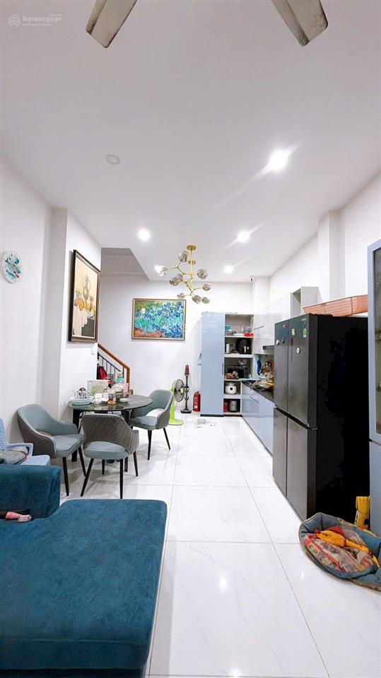 Mua bán nhà quận 4, trục đường khánh hội, 4 tầng hoàn công, nở hậu l vuông vắn!