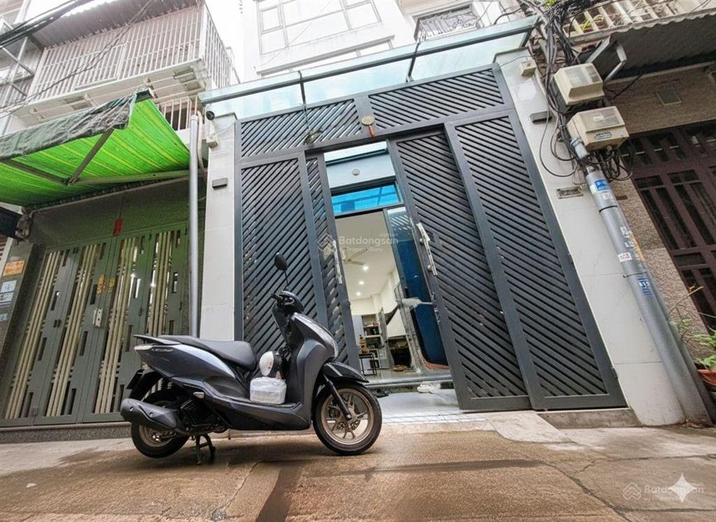 Mua bán nhà quận 4, trục đường khánh hội, 4 tầng hoàn công, nở hậu l vuông vắn!