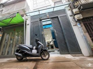 Mua bán nhà quận 4, trục đường khánh hội, 4 tầng hoàn công, nở hậu l vuông vắn !