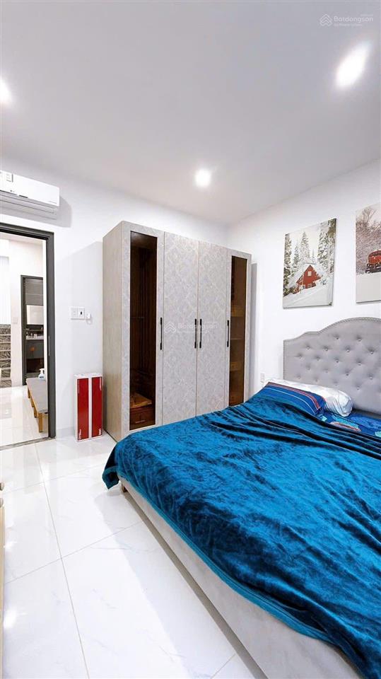 Mua bán nhà quận 4, trục đường khánh hội, 4 tầng hoàn công, nở hậu l vuông vắn!