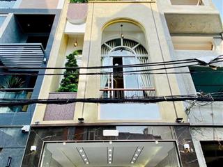 Bán nhà 688/ quang trung p11 ngang 4m6 có thang máy đường xe tải 6m