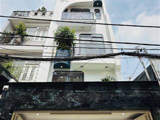 Nhà xây mới  thang máy bùi quang là hẻm xe hơi 1/ trệt lửng 4 lầu có phòng karaoke