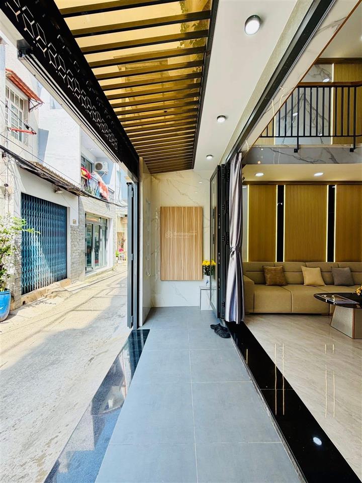 Bán nhà 309/2 nguyễn oanh p17 có thang máy 8,8 tỷ ngang 6m trệt lửng 2 lầu