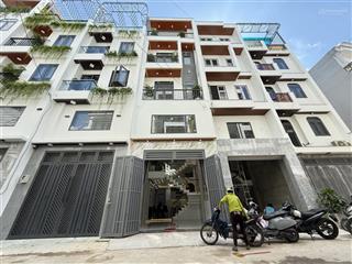 Nhà đường thông trần quang cơ, dt4x13m, lửng, 3lầu, 4pn, gara ô tô, sân thượng, hướng đông, 6,4 ty