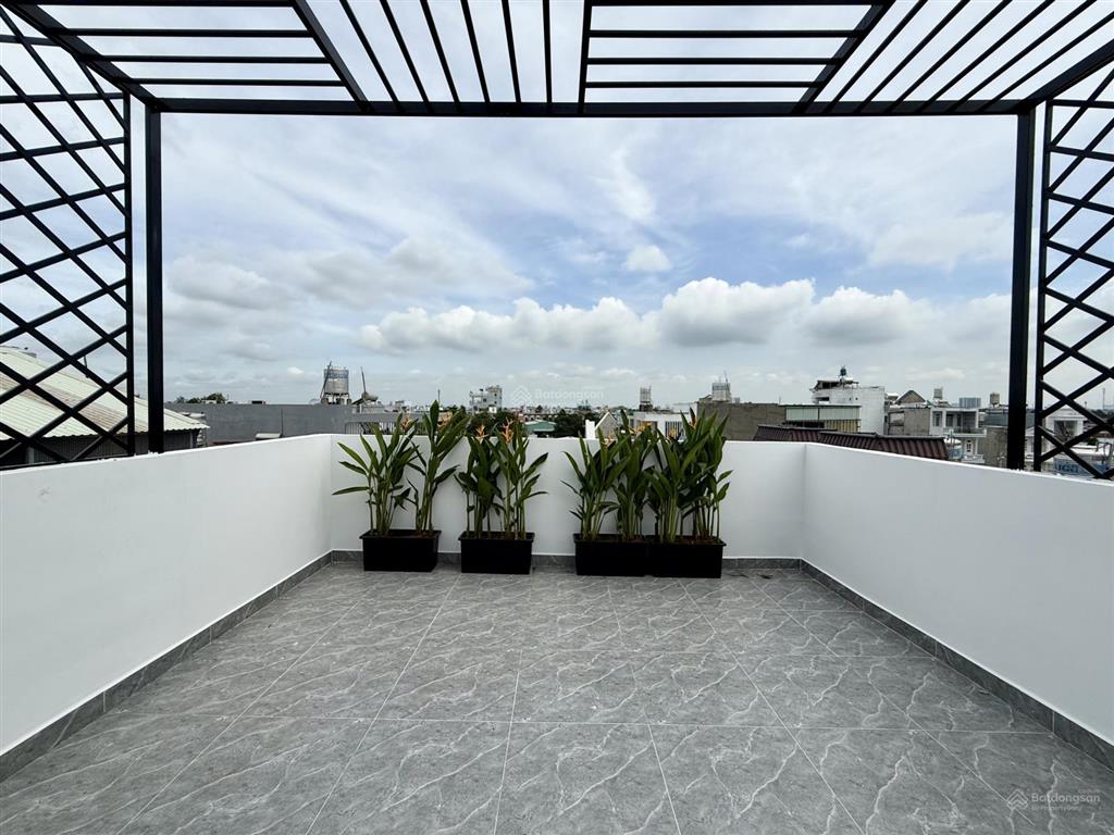 Nhà thạnh lộc 19, dt 4,5x14m, lửng, 3 lầu, 4pn, gara ô tô, sân thượng, hướng đông nam, 6,85 tỷ