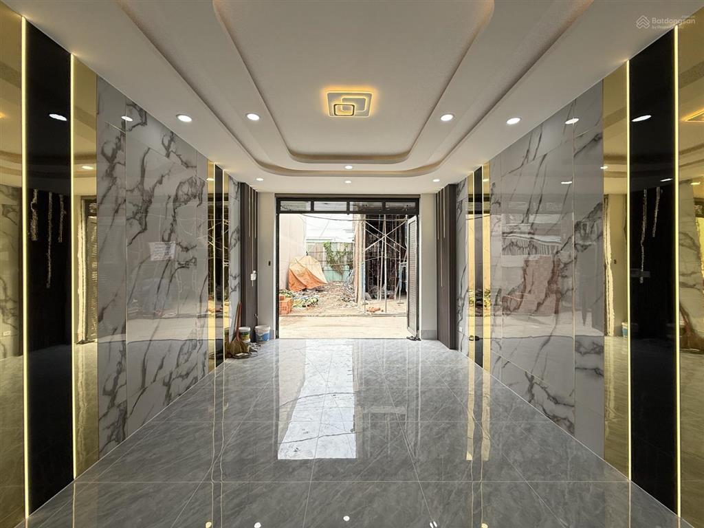 Nhà thạnh lộc 19, dt 4,5x14m, lửng, 3 lầu, 4pn, gara ô tô, sân thượng, hướng đông nam, 6,85 tỷ