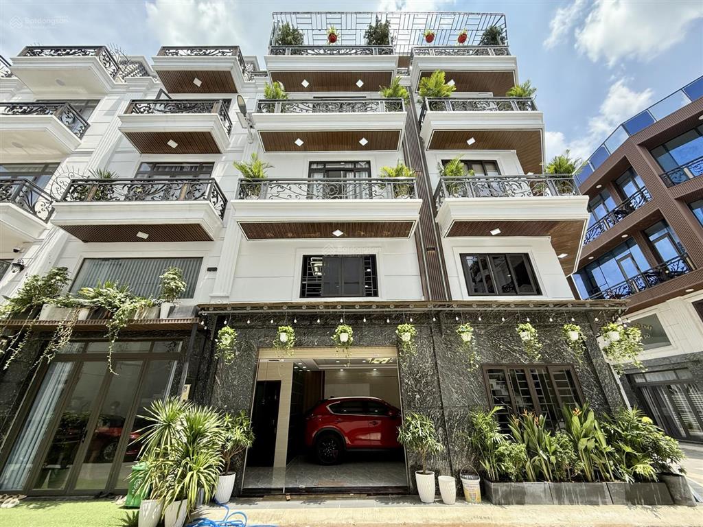 Nhà góc 2 mt đường tx 35, dt 5.10x11m, lửng, 3lầu, 4pn, 5vs, gara ô tô, sân thượng, 7.2 tỷ