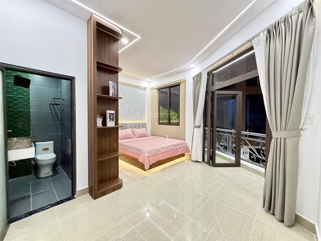 Nhà góc 2 mt đường tx 35, dt 5.10x11m, lửng, 3lầu, 4pn, 5vs, gara ô tô, sân thượng, 7.2 tỷ