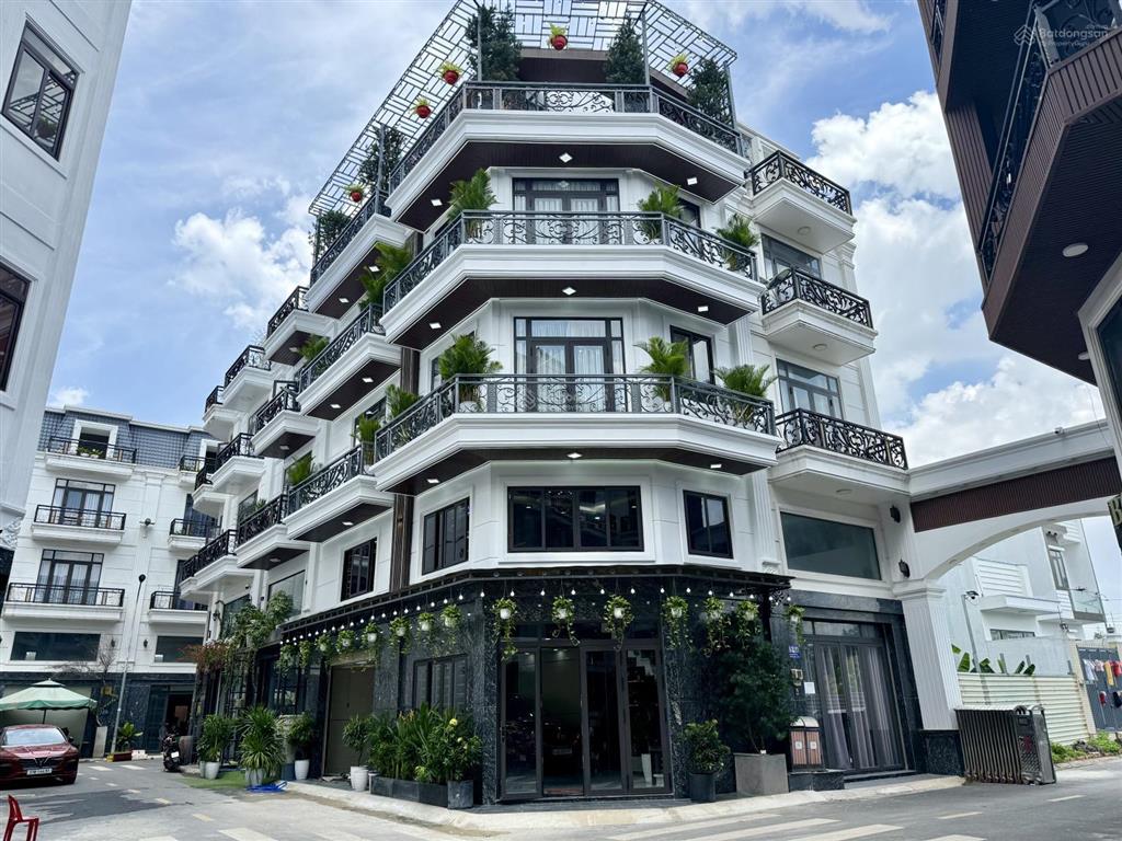 Nhà góc 2 mt đường tx 35, dt 5.10x11m, lửng, 3lầu, 4pn, 5vs, gara ô tô, sân thượng, 7.2 tỷ